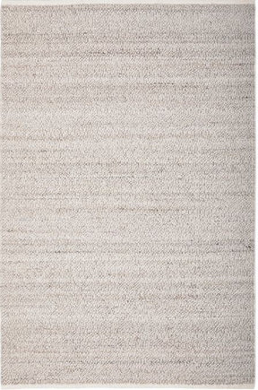 Konya natural boucle area rug with looped pile in a contemporary living room