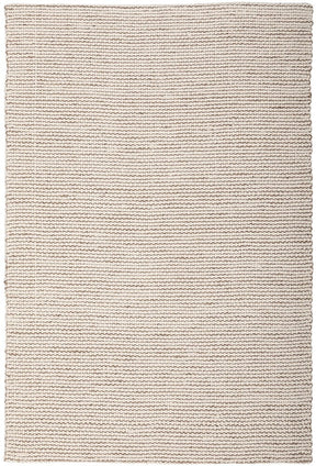 Nishapur cream hand loomed wool and jute area rug in a warm living room