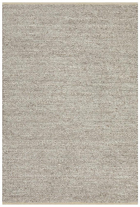 Yazd natural wool viscose area rug with deep pile in a modern dining room