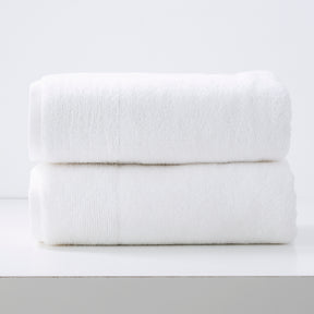 Lagos 650 GSM zero twist cotton bath sheet pair in a modern bathroom