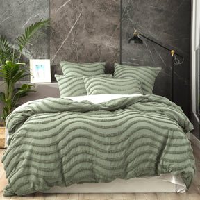 Sage chenille wave tufted cotton quilt cover with two pillowcases on a King bed