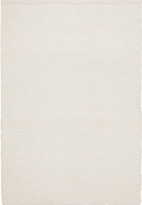 Bijar white hand loomed wool area rug with subtle texture in a bright bedroom