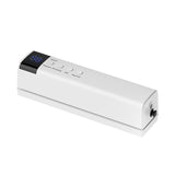 Portable vacuum sealer stored in a kitchen drawer alongside utensils