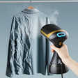 Olvera handheld garment steamer with a transparent water tank