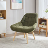 Hargraves olive green fabric wingback chair in a modern living room