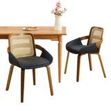 Greenock black rattan back dining chair in a modern dining room