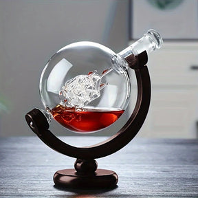 Sirmione globe whiskey decanter set with two glasses and rotating wooden stand