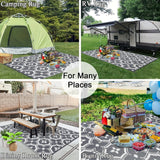 Reversible geometric braided outdoor patio mat