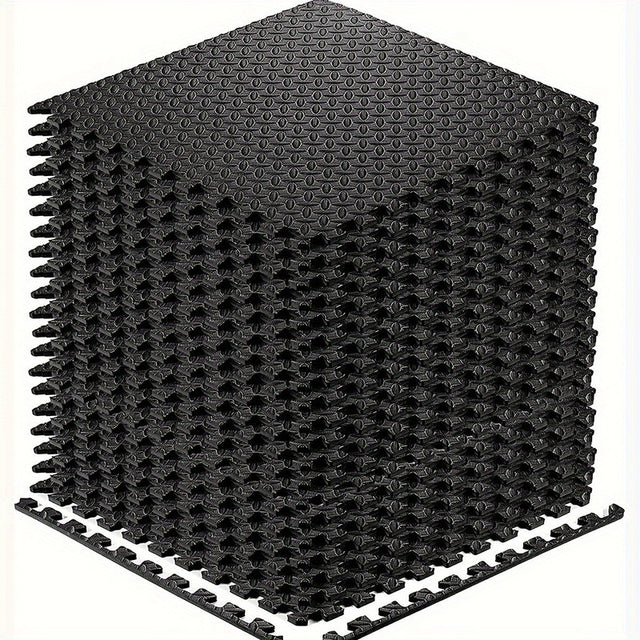 Black interlocking EVA foam fitness floor tiles joined together
