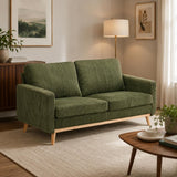 Roses Moss fabric sofa in a modern living room