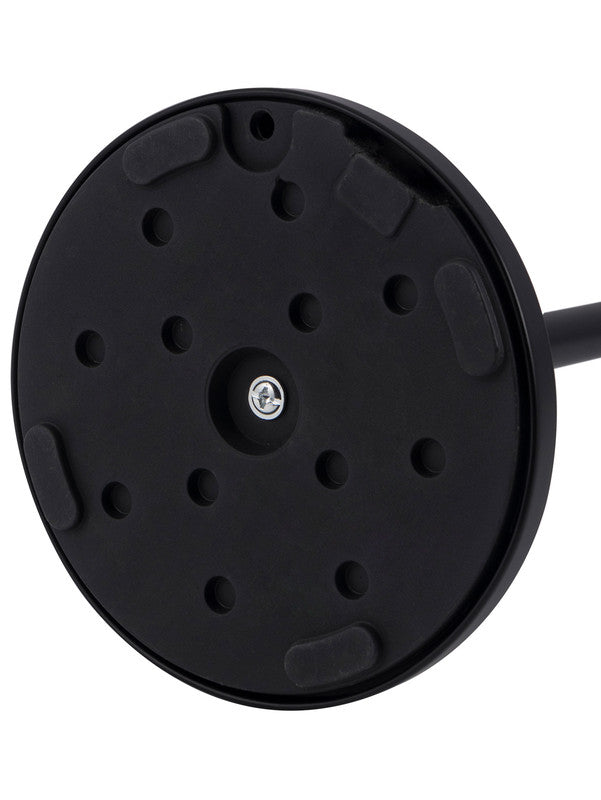 Freestanding black toilet roll holder styled in a modern bathroom corner
