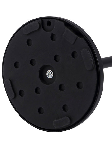 Freestanding black toilet roll holder styled in a modern bathroom corner