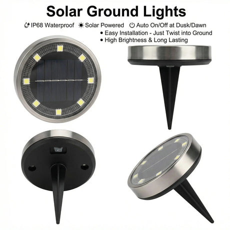 Warm white solar ground lights lining a garden pathway at night