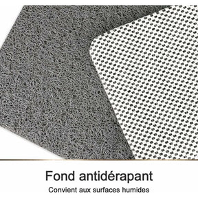 Non slip PVC shower mat, 60 cm, with looped loofah surface and drainage holes on a bathroom floor