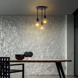 3 Light black industrial pendant light, interior setting