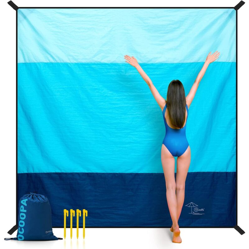 Bowness marine life print beach blanket 210 x 200cm in ripstop nylon anchored on sand with corner sand pockets and stakes