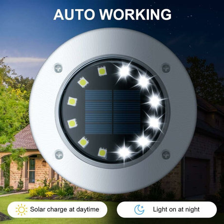 Stainless steel solar ground light with white LEDs in a garden