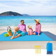 Troutbeck blue and grey beach blanket 210 x 200cm anchored on sand with corner stakes and breathable water resistant polyester top