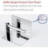 Wall mounted chrome roll holder with shelf above a toilet