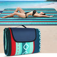 Ambleside extra large fleece picnic blanket 200 x 200cm spread on a park lawn with soft fleece top and water resistant PEVA backing