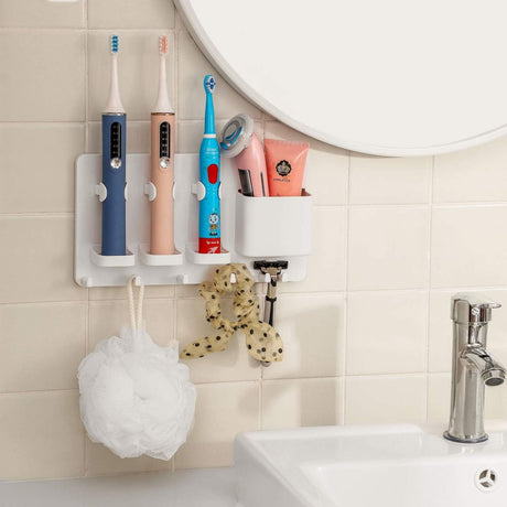 Drainage holes at the base of the electric toothbrush cradles