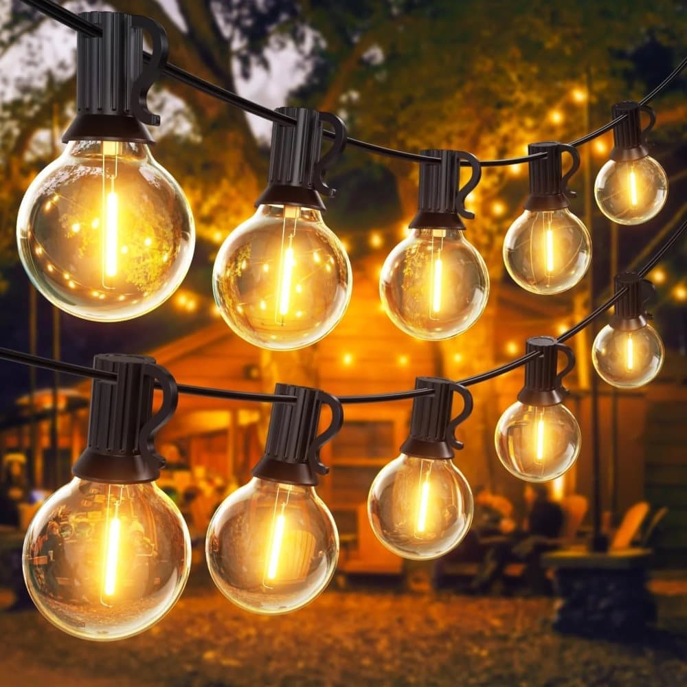 Warm white G40 globe string lights lighting a pergola at night