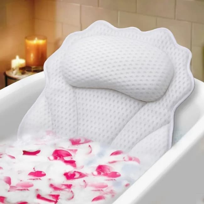 White padded bath pillow with ergonomic 4D air mesh surface for neck support