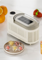 Dimensions of purple portable ice maker, 21.6 by 9.3 by 12.8 centimetres