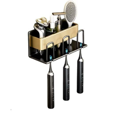 Gold aluminium toothbrush holder with cup mounted on a bathroom wall above the basin