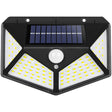 Four sided 100 LED solar motion sensor light mounted on a garden wall