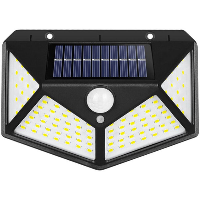 Four sided 100 LED solar motion sensor light mounted on a garden wall