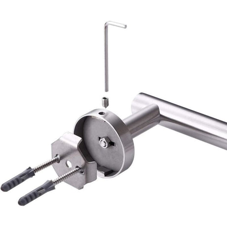 Toilet paper holder shown installed vertically beside a vanity