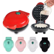 Red portable mini electric waffle maker with the lid closed