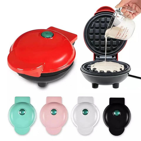 Red portable mini electric waffle maker with the lid closed