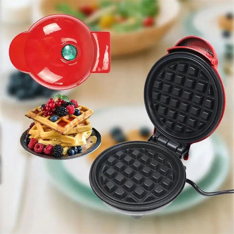 Freshly cooked waffle in the compact 420 W red waffle maker
