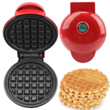 Compact red waffle maker shown on a kitchen bench for scale