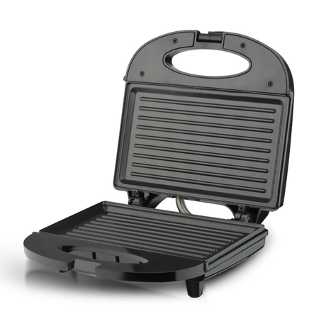 Grill press opened to show ribbed non stick upper and lower plates