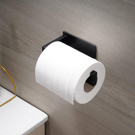 Toilet roll loaded on the compact black stainless steel holder