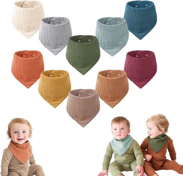 Set of ten soft cotton baby bibs in assorted colours