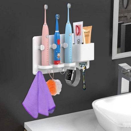 Close view of the ventilated drainage base of the white toothbrush holder
