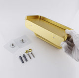 Close up of the recessed tray top and raised side railing on the gold shelf