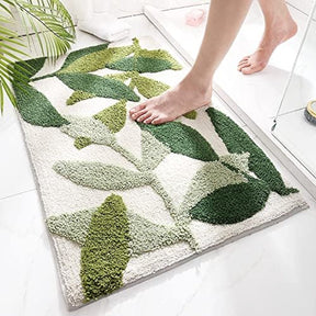 Microfibre bath mat 50 x 80 cm with a green leaf print design