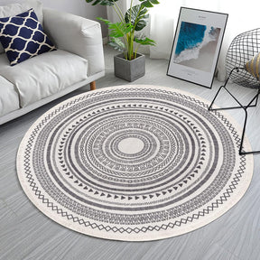 Grey fringed Moroccan-style round cotton rug, 120cm diameter