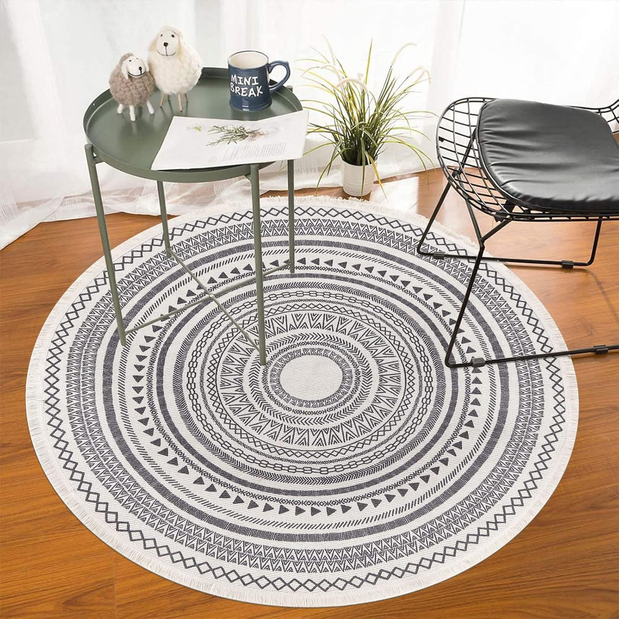 Grey round rug showing Moroccan-style printed pattern