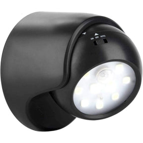 Battery motion sensor wall light with 360 degree head mounted by a porch