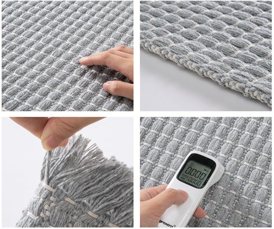 Close up of the braided tufted microfibre texture on the beige bath mat