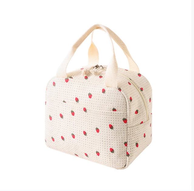 White corduroy insulated lunch bag with printed design and foil lining