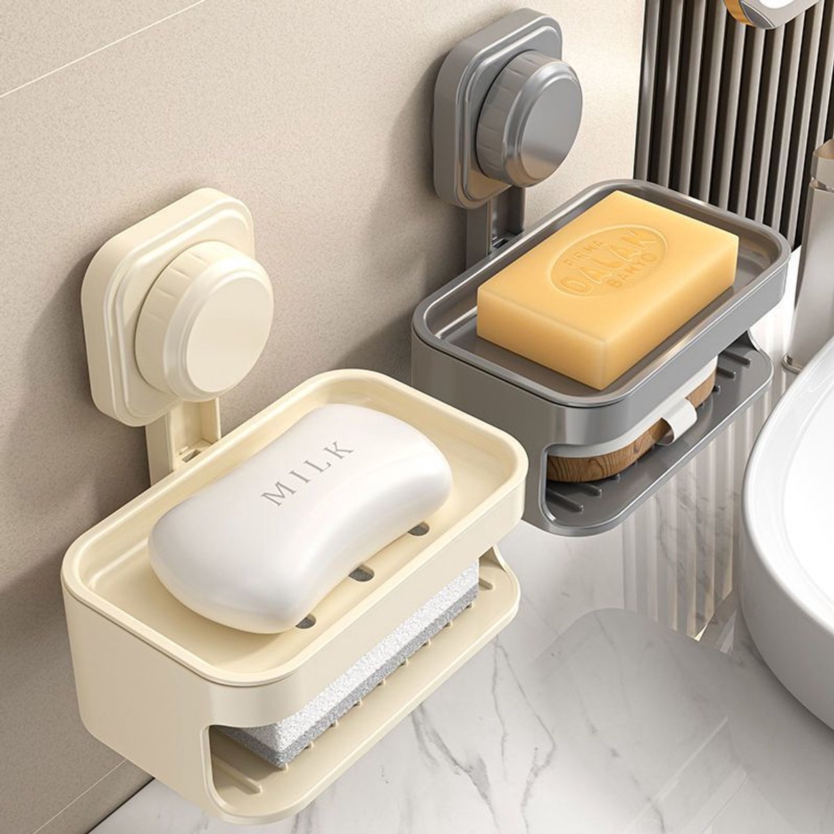 Suction cup soap dish mounted on a tiled wall holding a soap bar