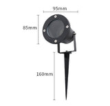 5W LED outdoor spotlight with white beam uplighting a garden