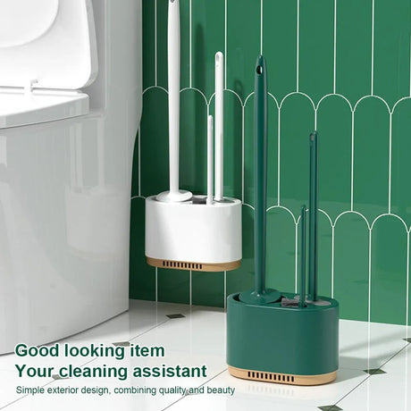 Dark green toilet plunger stored in the shared wall mounted holder